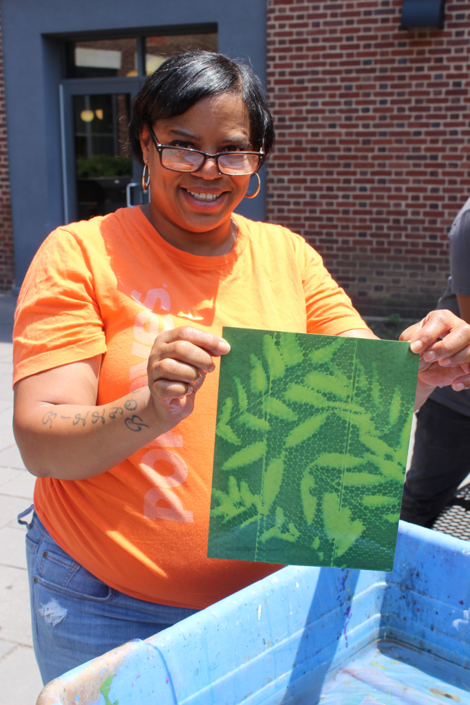 Woman holding cyanotype