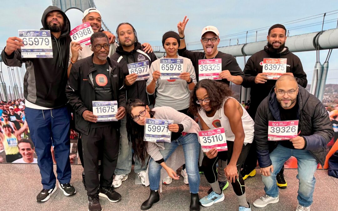 Members of Team Odyssey at the 2025 NYC Marathon Expo.